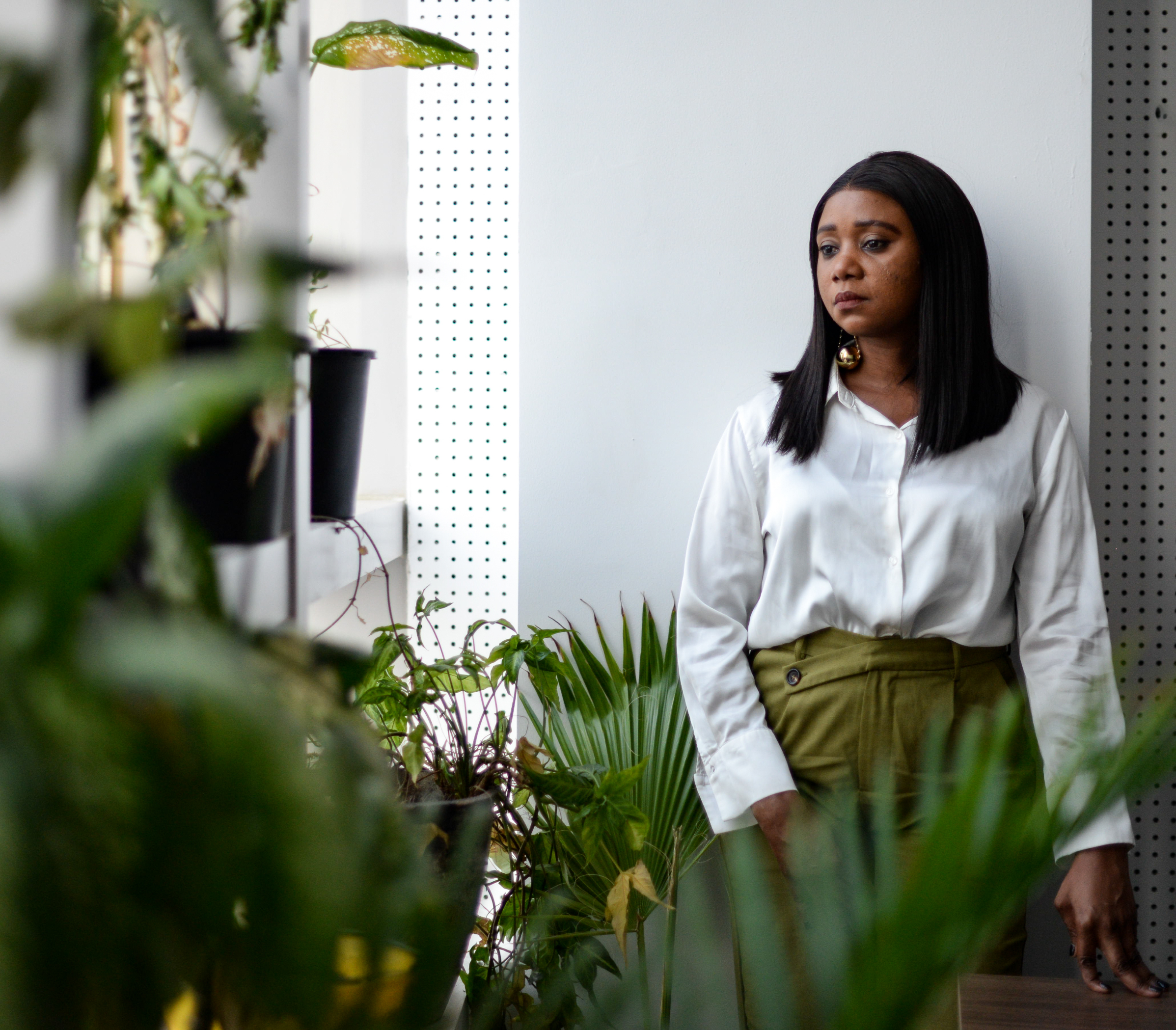 Eugenia Kargbo, Freetown's chief heat officer and Climate Resilience for All's African heat strategist, pauses in her office in Freetown, January 14, 2025. CRA/Olivia Acland