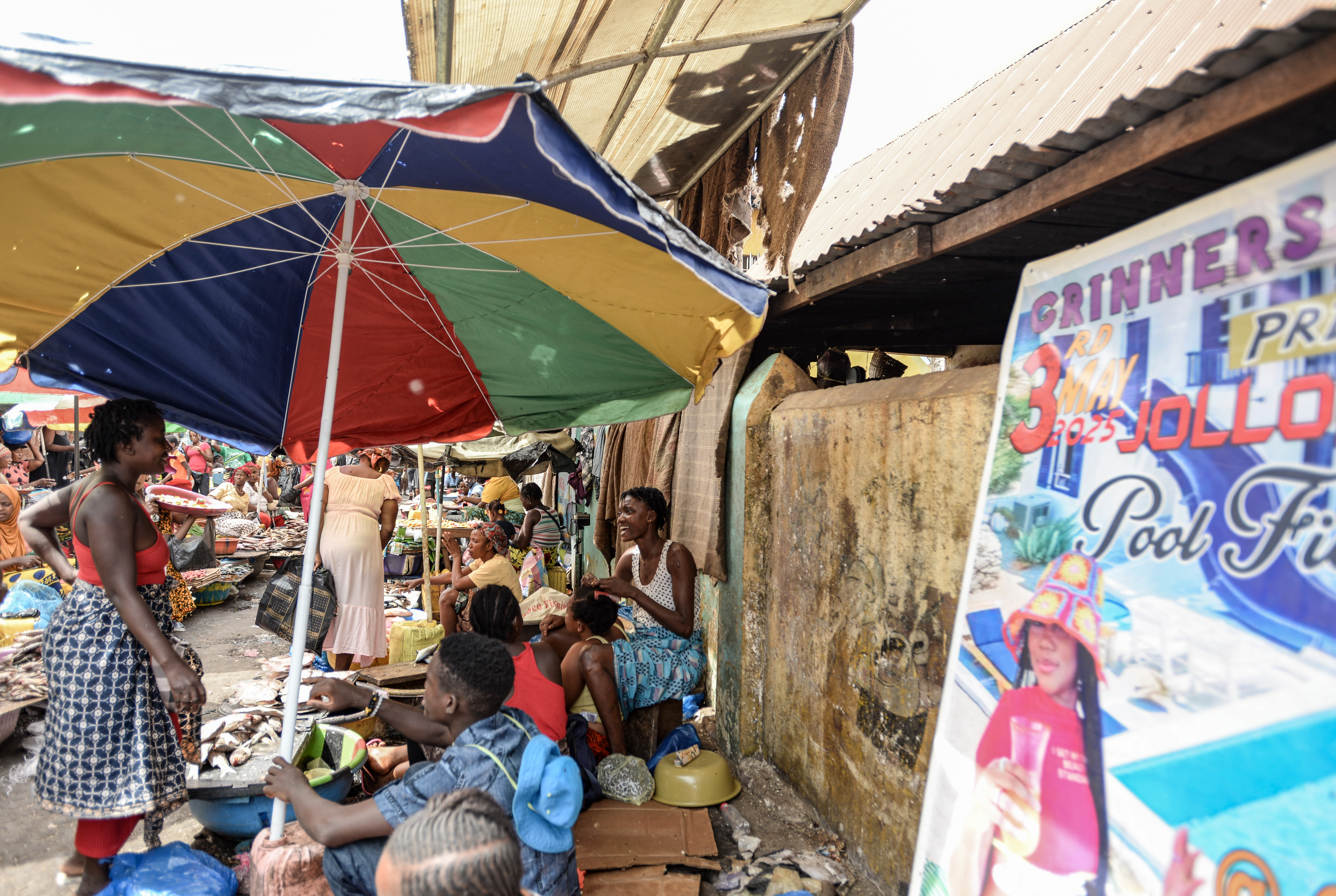 Women sell their wares in Congo Market in Freetown, Jan. 11, 2025. CRA/Olivia Acland