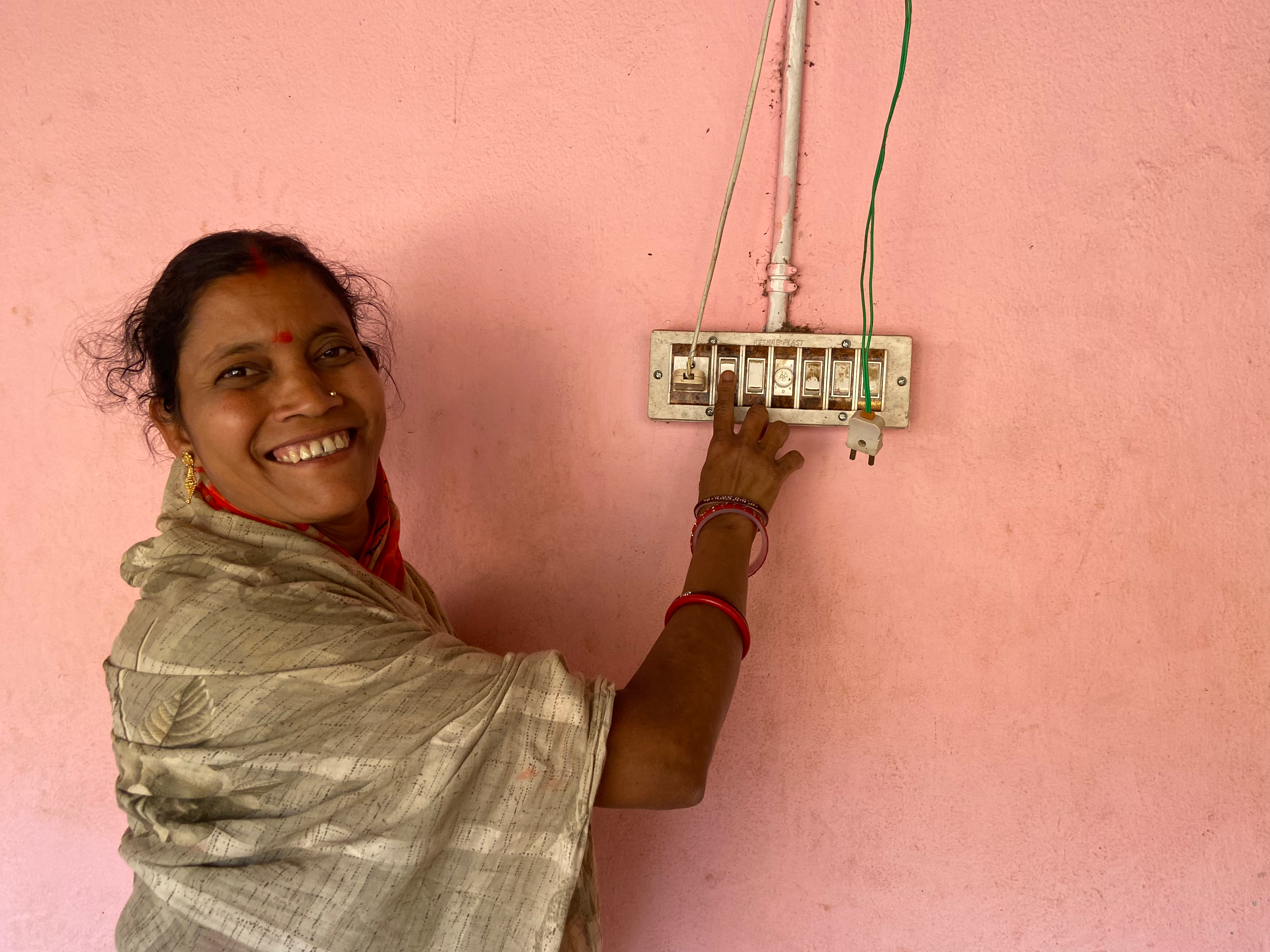 Farmer Saudamini Pradhan, who once carried buckets of water to her home, now flips a switch to pump water from the village well into her house in the village of Bhagatpur, in India’s Odisha state, on February 28, 2025. Roli Srivastava/The Migration Story