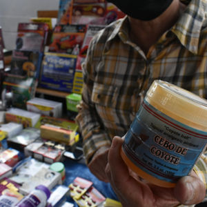 A vendor who sells health products in Los Angeles, California, says the extreme heat discolors certain products and causes gels like this muscle rub to leak out of their seals. September 21, 2025. Climate Resilience for All/Rachel Parsons