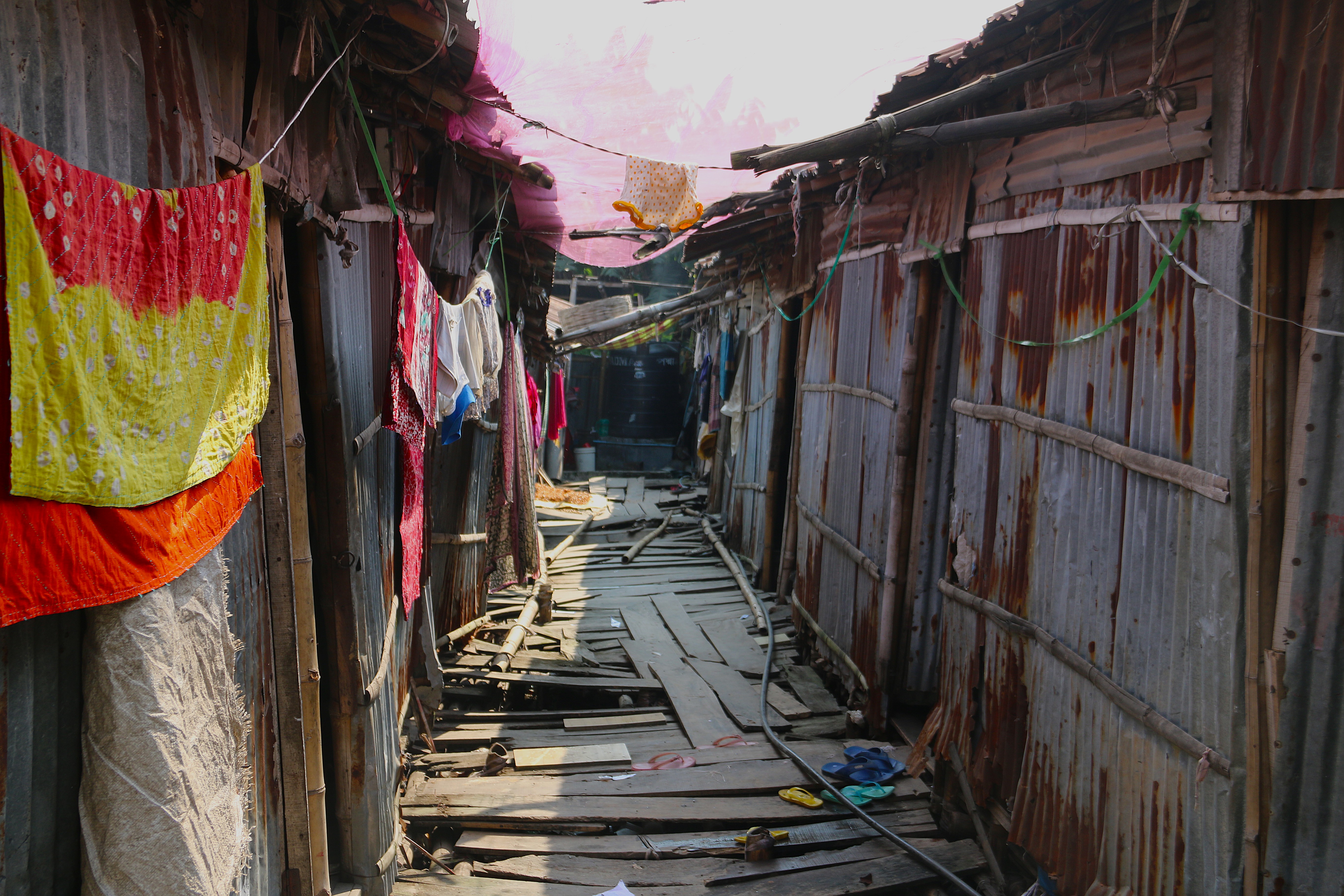 A view of the overcrowded Pallabi neighborhood in Dhaka, Bangladesh, where Najma Begum, a cook and cleaner for a wealthy family, lives, mainly with other climate migrants from northern Bangladesh. October 10, 2025. Climate Resilience for All/Tanvir Ahmed