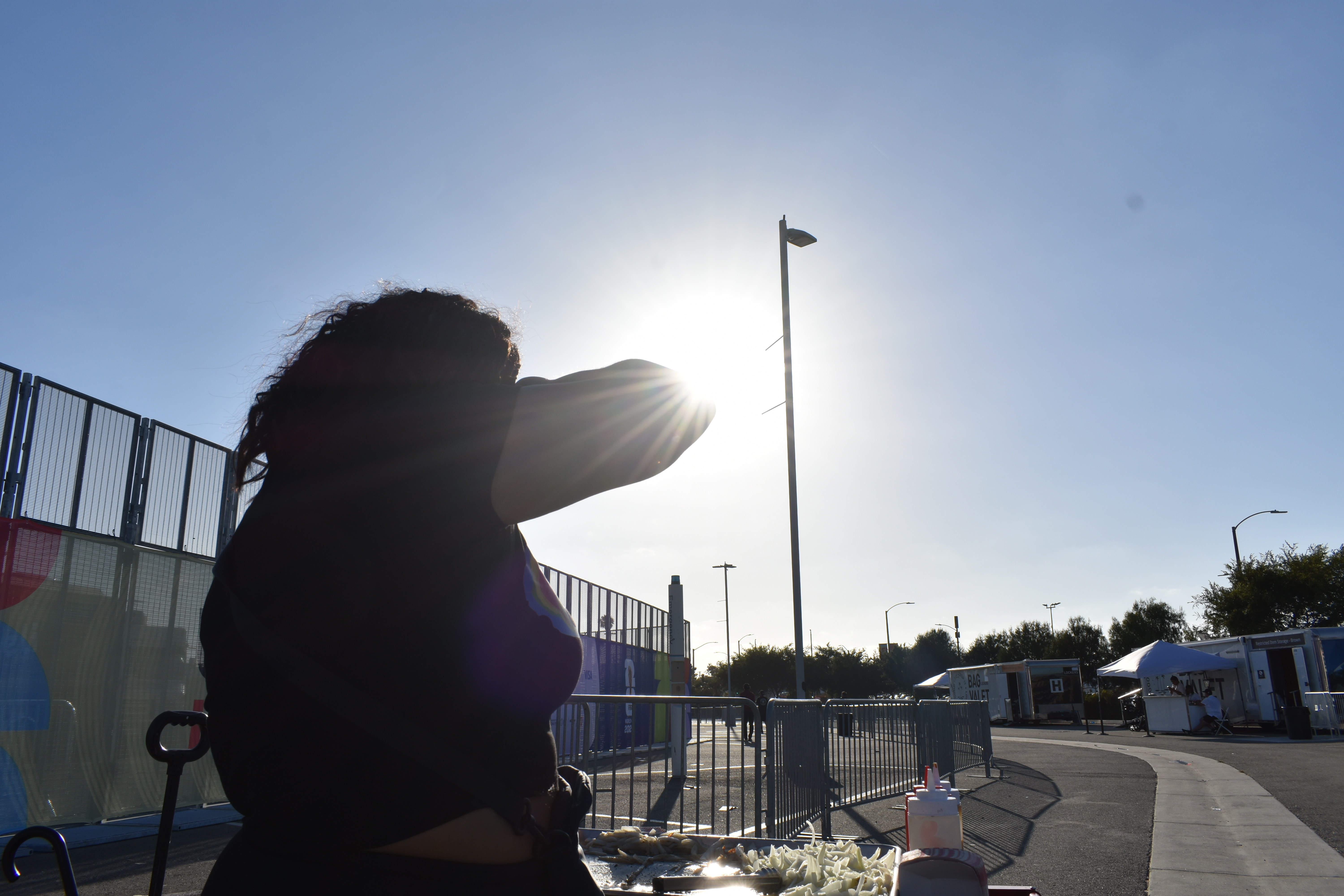 Street vendor Angela Reyes watches the last few fans trickle into Los Angeles Stadium, June 15, 2026. HERA/Rachel Parsons