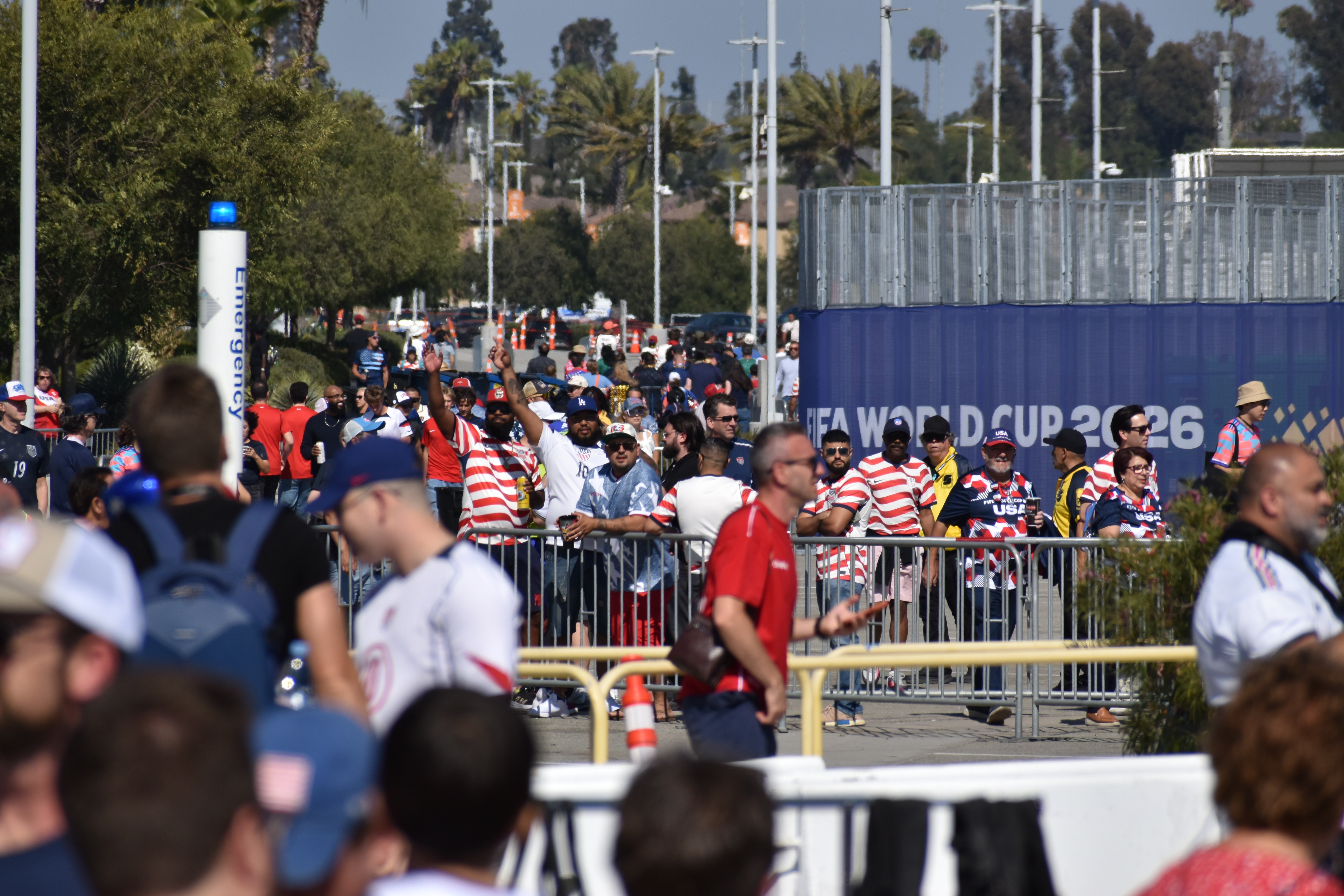 World Cup game ticket holders enter the stadium on a hot day in Los Angeles
